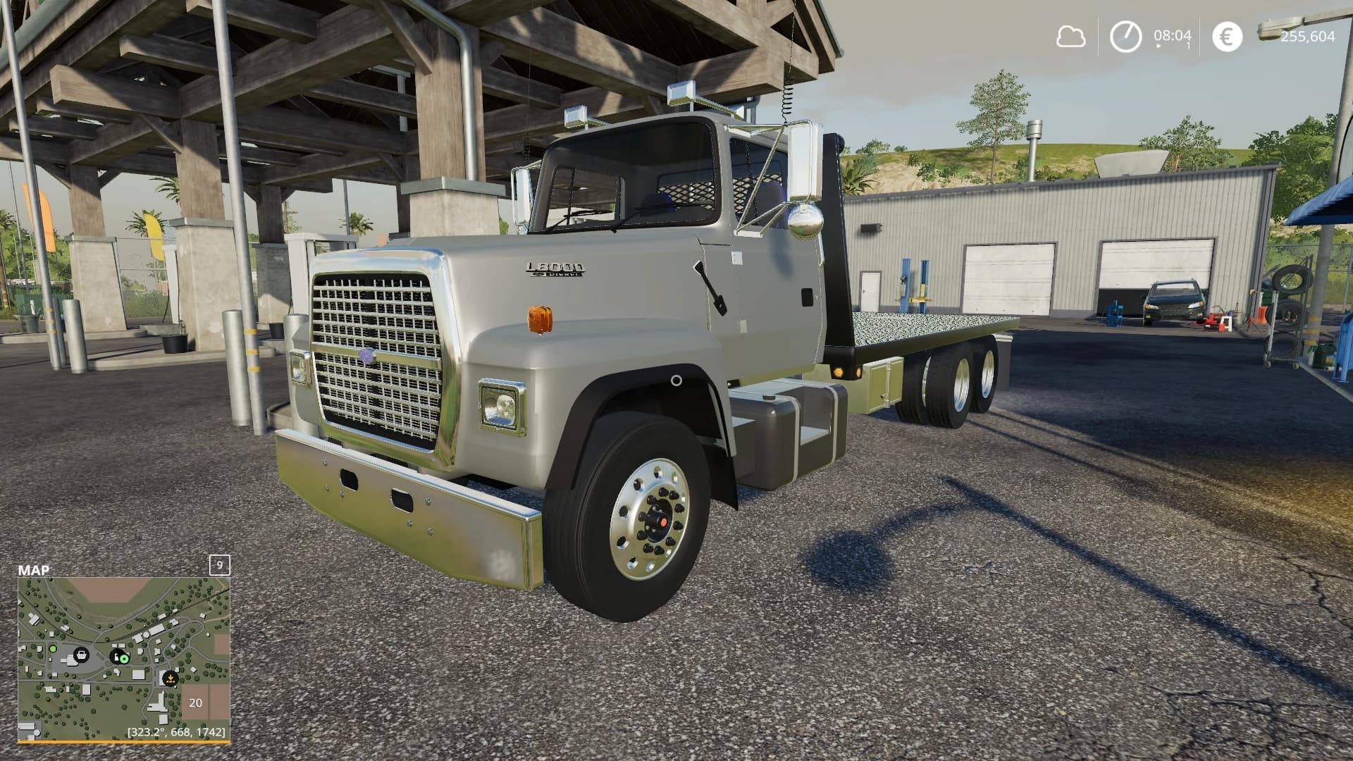 FORD L8000 FLATBED/AR TRUCK 4