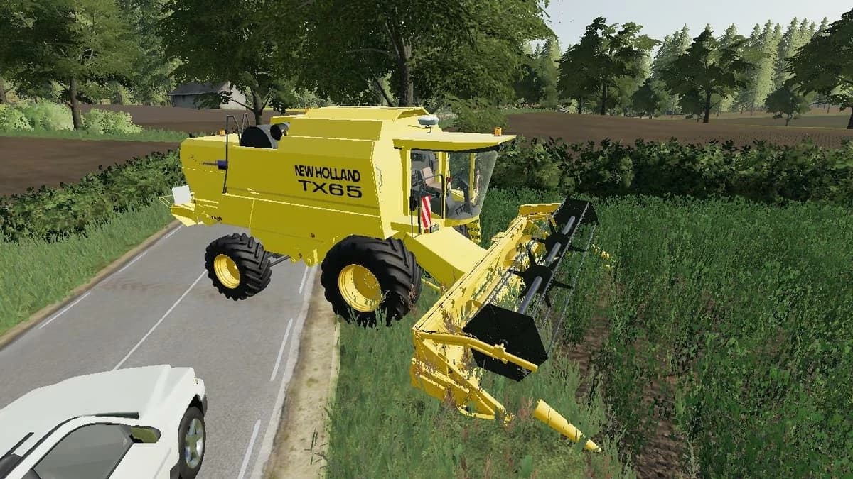 NEW HOLLAND TX65 PLUS 2
