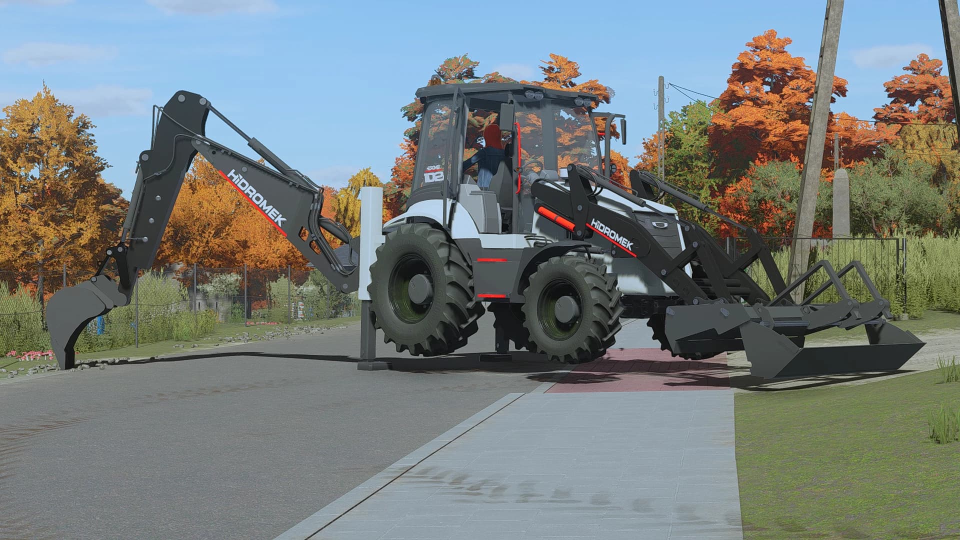 HMK 102B Backhoe Loader 2