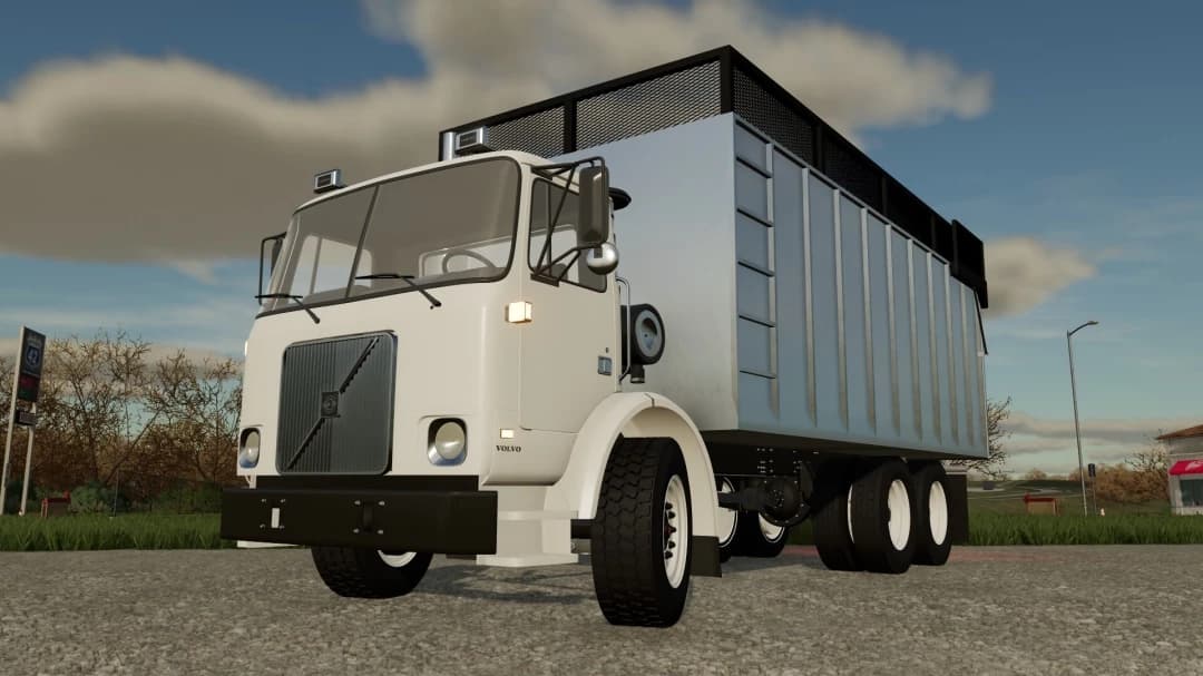 VOLVO WX64 FLATBED/AR TRUCK