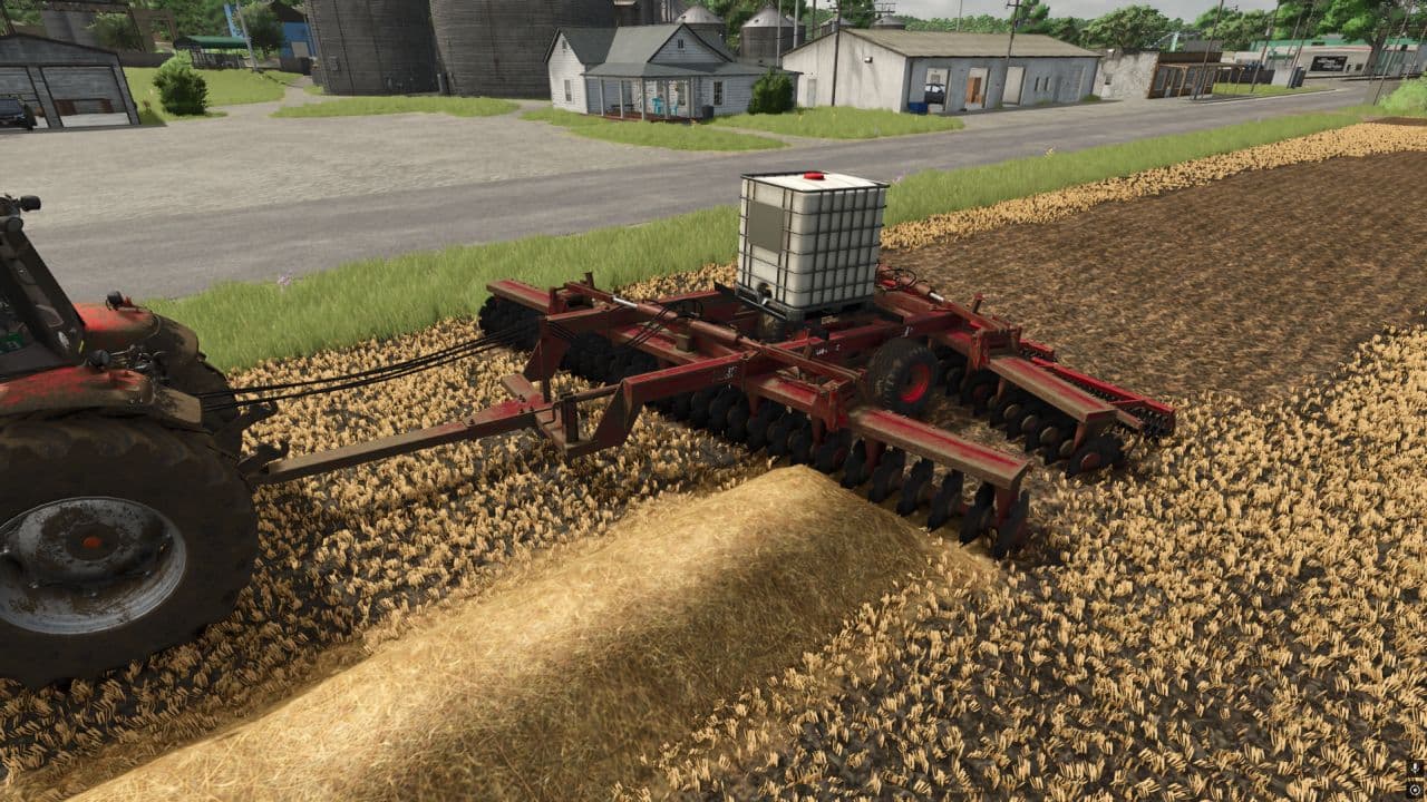 Kuhn 770 with IBC fertilizer tank