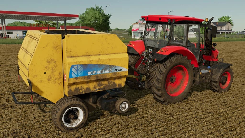 NEW HOLLAND BR 6090 AND CASE RB 344