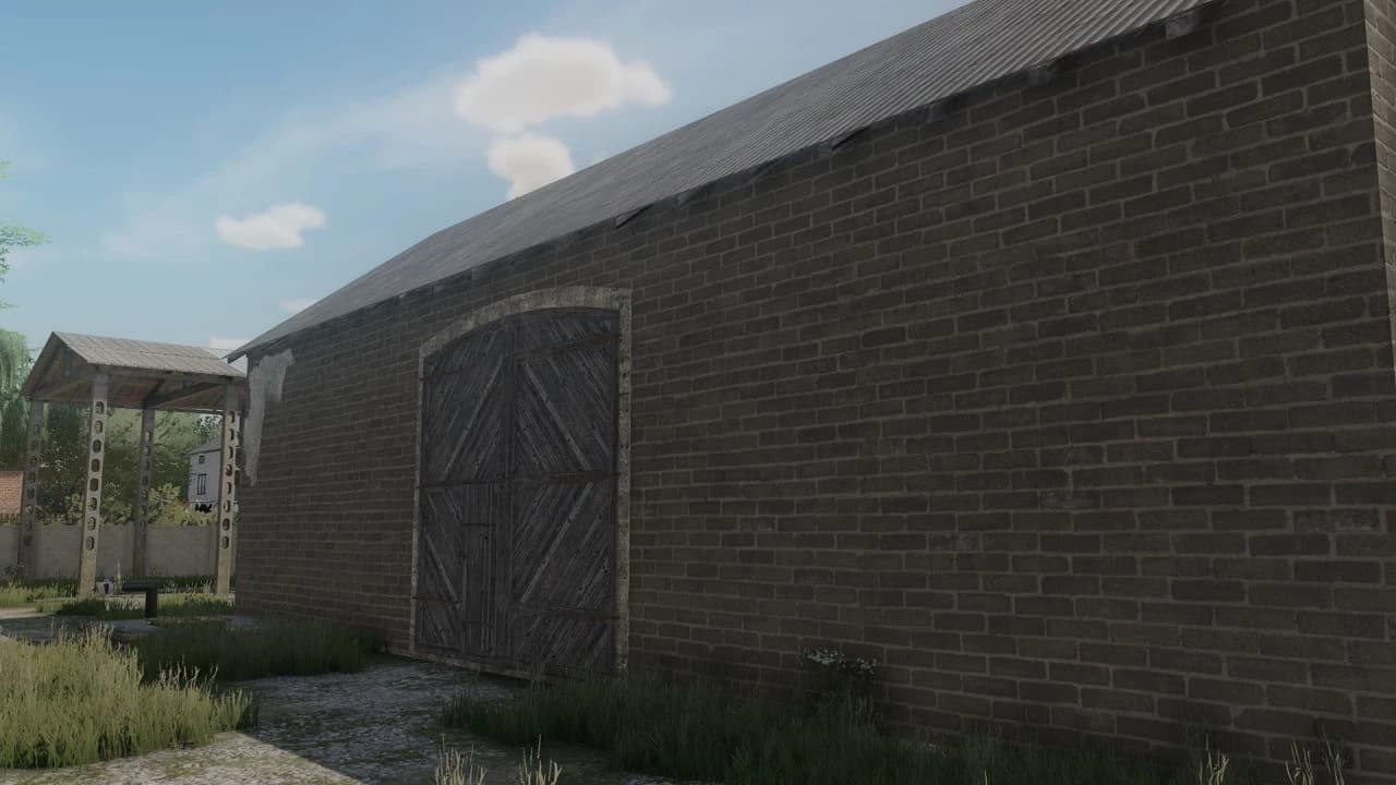 BRICK FARM BUILDING WITH COWS